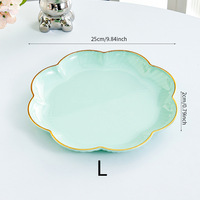 2025 maison Table à manger haut de gamme Snack assiette moderne en plastique de qualité alimentaire léger luxe fruits et scories plat nouveau Os cracher Style