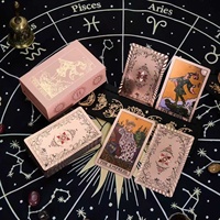 Vente en gros de cartes de tarot classiques en PVC imperméables personnalisées, modèle Soleil Univers Noir Or, emballage en boîte de couleur créative, manuel d'utilisation