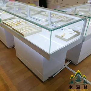 Vitrine en verre vitrine à bijoux magasin comptoir en or design et mobilier de magasin personnalisé pour bijoux parfait utilisé dans les centres commerciaux