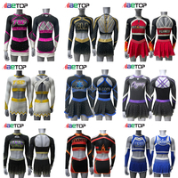 Tenue de performance Elite Cheer |   Uniforme de cheerleading violet, noir et argenté, à épaules dénudées, avec accents en strass et découpe au dos, service OEM