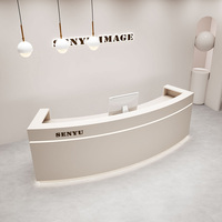 Comptoir laqué moderne semi-circulaire personnalisé de luxe de lumière de bureau de réception pour le magasin d'habillement de salon de beauté caissier incurvé