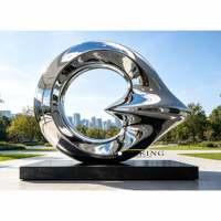 Grande sculpture d'art en acier inoxydable avec base noire, sculpture abstraite en métal de luxe pour la décoration de jardin