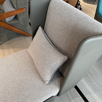 Chaise longue inclinable à dossier haut pour hôtel, en tissu, avec repose-pieds en cuir, pour salon d'hôtel
