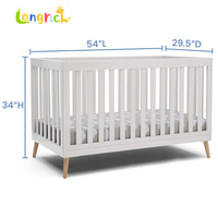 Lit bébé convertible 4-en-1 moderne en bois, finition blanche, pieds en bois naturel, hauteur de matelas réglable, pin massif, lit OEM