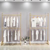 Porte-vêtements en métal doré de luxe moderne et robuste sur mesure pour balcon et armoire