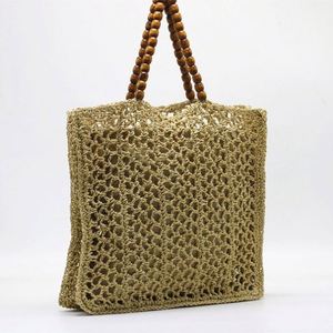 Bolso de playa de malla de ganchillo hueco para mujer, novedad de verano 2025, con asa de cuentas de madera - Product Image 6