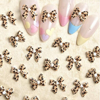 50 pièces de nœuds en ruban en résine à imprimé léopard, accessoires de nail art aux tons doux automne/hiver, personnalisés et prêts pour les fêtes