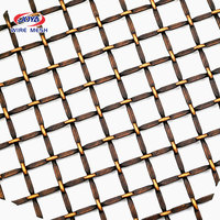 Mur-rideau décoratif en treillis métallique tissé pour ascenseur de bâtiment en acier inoxydable spiralé métallique en laiton doré pour l'extérieur