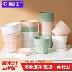 Pot de fleurs circulaire en plastique minimaliste nordique pour plantes et fleurs vertes, à poser sur un bureau ou au sol, pour usage domestique. - Product Image 4