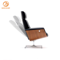 Fauteuil de bureau inclinable de luxe au design italien moderne avec appui-tête et repose-pieds, pivotant à 360°, idéal pour la salle de sport