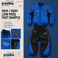 Ensemble de survêtement personnalisé pour homme, bleu et noir, avec col montant, passepoil contrastant et design à panneaux, usine OEM ODM