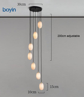 Lustre ovale minimaliste postmoderne en albâtre, lampe suspendue artistique sphérique multi-lumières pour escalier, villa, salon