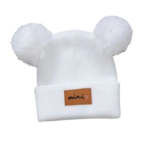 Chapeau en <span class=keywords><strong>tricot</strong></span> tendance automne-hiver avec étiquette en cuir <span class=keywords><strong>pour</strong></span> garçons et filles, style décontracté <span class=keywords><strong>facile</strong></span> à assortir - Product Image 1