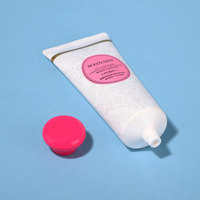 Tube cosmétique en PE blanc mat à motif vintage de 100 ml avec bouchon à vis rond rose, emballage élégant et féminin pour lotion corporelle