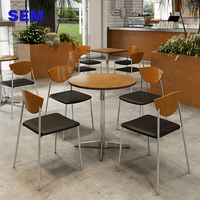 Set Tavolo e Sedie in Compensato Marino Moderno con Struttura in Acciaio Inossidabile per Ristoranti Ocean Board Cake, Caffetterie e Negozi di Tè al Latte