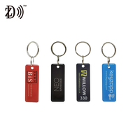 Station de charge personnalisée étanche avec impression de codes-barres RFID Epoxy NFC Tag porte-clés RFID avec anneau en métal