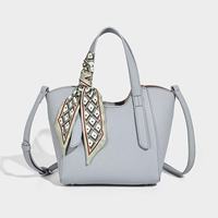 Sac à main bandoulière pour femme, motif grain de litchi, style minimaliste, forme panier, durable, léger, portable, avec bouton, imperméable, Nouveauté 2026