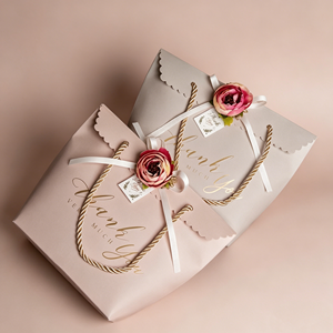 Premium Sustainable Eco‑friendly Scalloped Edge Cardboard Gift Bags Wholesale With Twine Handle Ribbon Closure Artificial Flower - Product Image 1