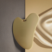 Outil de massage facial en acier inoxydable Gua Sha en forme de cœur pour le soin de la peau, lifting, décongestionnement, contouring de la mâchoire, outil de beauté anti-rides pour les yeux et le cou