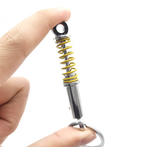 Bán Buôn Hot Chàng Trai Treo Quà Tặng Xe Sửa Đổi Bộ Phận Mùa Xuân Cũ Sốc Hấp Thụ Mô Hình Đầy Màu Sắc Kẽm Hợp Kim Móc Chìa Khóa - Product Image 4