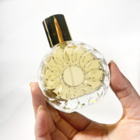 Bouteille de parfum ronde transparente pour voiture Bouteille de parfum en verre gaufré Nouveau design Conteneur cosmétique Bouteille de parfum vide 50ml