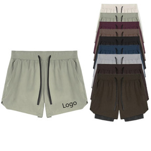 Shorts d'été pour hommes S-3XL, deux couches, avec poches, pantalon de surf, couleur unie, taille élastique à cordon, grande taille, short de plage pour hommes - Product Image 1