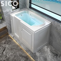 Baignoire autoportante en acrylique pour personnes âgées avec accès sécurisé, porte à basse hauteur et barres d'appui pour usage hôtelier