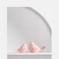 La populaire décoration d'oiseau en céramique inclinable rose d'Instagram