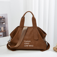 Sac fourre-tout géométrique uni personnalisé à faible MOQ pour femme, en cuir végétalien, bandoulière, poignée supérieure, luxe, portable, automne-été, résistant à l'eau