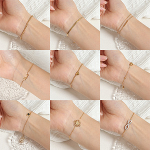 Pulsera de acero de titanio de 8 caracteres de alta calidad europea <span class=keywords><strong>americana</strong></span> para <span class=keywords><strong>mujer</strong></span>, eslabón de cadena de moda con pulseras chapadas en oro - Product Image 5