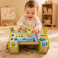 Table d'activités en bois en gros avec volant, planche d'activités Montessori, jouet sensoriel pour l'apprentissage de la motricité fine et le jeu d'imitation OEM ODM