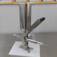 Machine manuelle de remplissage de crème pour choux à la crème, pâte de cacahuète, confiture, chocolat, gâteaux, pains et beignets