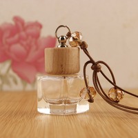 Diffuseur d'arômes pour voiture en bois, 10 ml, désodorisant, flacon de parfum suspendu pour voiture avec bouchon en bois, vente en gros
