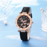 Nouvelle montre à quartz à bracelet numérique simple pour femmes avec bracelet en cuir à la mode et boîtier en alliage à cadran en verre