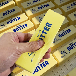 Jouet anti-stress en PU souple à rebond lent, modèle de bâton de beurre, jouet de simulation alimentaire en forme de pain, jouet de décompression, vente en gros, best-seller - Product Image 1