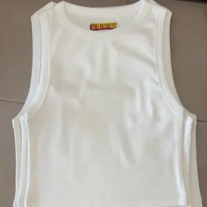 Camiseta sin mangas de algodón puro para levantamiento de pesas o correr con tu propio logotipo