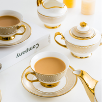Tasse à thé en céramique européenne personnalisée avec bord doré pour desserts, gâteaux, collations, fruits secs, apéritifs, théière pour mariage, fête, hôtel, vente en gros