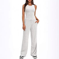 Ensemble décontracté printemps-été pour femme : haut court sans manches en polyester tricoté de couleur unie à col rond et pantalon large taille haute
