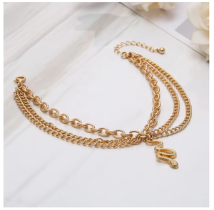 Bracelet <span class=keywords><strong>de</strong></span> <span class=keywords><strong>cheville</strong></span> chic plaqué <span class=keywords><strong>or</strong></span> <span class=keywords><strong>jaune</strong></span> à trois rangs, chaîne serpent, pendentif croix, détail pompon - Product Image 3