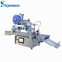 Machine d'étiquetage automatique à jet d'encre pour surfaces planes avec alimentateur de feuilles pour papier, plastique, enveloppes manuelles, sacs, cartes