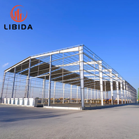 Entrepôt préfabriqué en acier moderne personnalisable, à grande portée, à structure métallique ouverte pour le stockage logistique