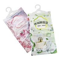 Sachets déshumidificateurs suspendus pour armoire, granulés de chlorure de calcium personnalisés 100g 200g, absorbants d'humidité jetables pour la maison