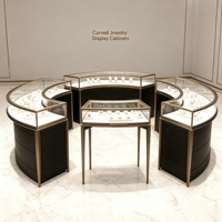 Ensemble de vitrine à bijoux incurvée, cadre en métal or champagne, dessus en verre trempé, base de rangement noire, éclairage LED, îlot à bijoux complet
