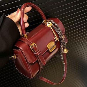 PU Leather Handbag with <b>Strap</b> <b>Buckle</b> and Metal Clasp Shoulder and Crossbody Design - Product Image 1