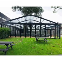Tente de réception de luxe à cadre noir, taille personnalisée, tente événementielle temporaire d'extérieur avec toit en PVC noir et parois latérales transparentes
