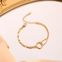 Ensemble collier et boucles d'oreilles pour femme, style bohème, en acier inoxydable plaqué or, avec motifs géométriques circulaires simples et élégants.