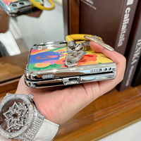 Étui en cuir avec cadre électroplaqué tendance pour iPhone Duo 18, étui pliable pour téléphone avec bracelet et cordon, motif de peinture à l'huile de dessin animé