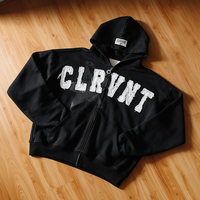 Sweat-shirt à capuche zippé noir pour homme, avec patch CLRVNT, lettres imprimées sur le devant, logo étoile C imprimé au dos, style streetwear vintage oversize