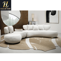 Canapé sectionnel contemporain en bouclette crème italienne avec base en acier inoxydable doré pour villa et hôtel