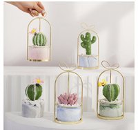 Paniers de fleurs suspendus en fil de métal doré d'approvisionnement d'usine en Chine Pot de fleurs décoratif de table Pot de plantes en fer facile à transporter